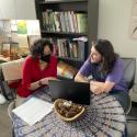 Dr. Barriga assisting a student in her office